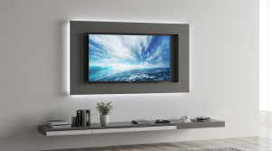 Salón moderno con televisor y barra de sonido montados en soporte de pared, mostrando un espacio limpio y optimizado, con cables ocultos.